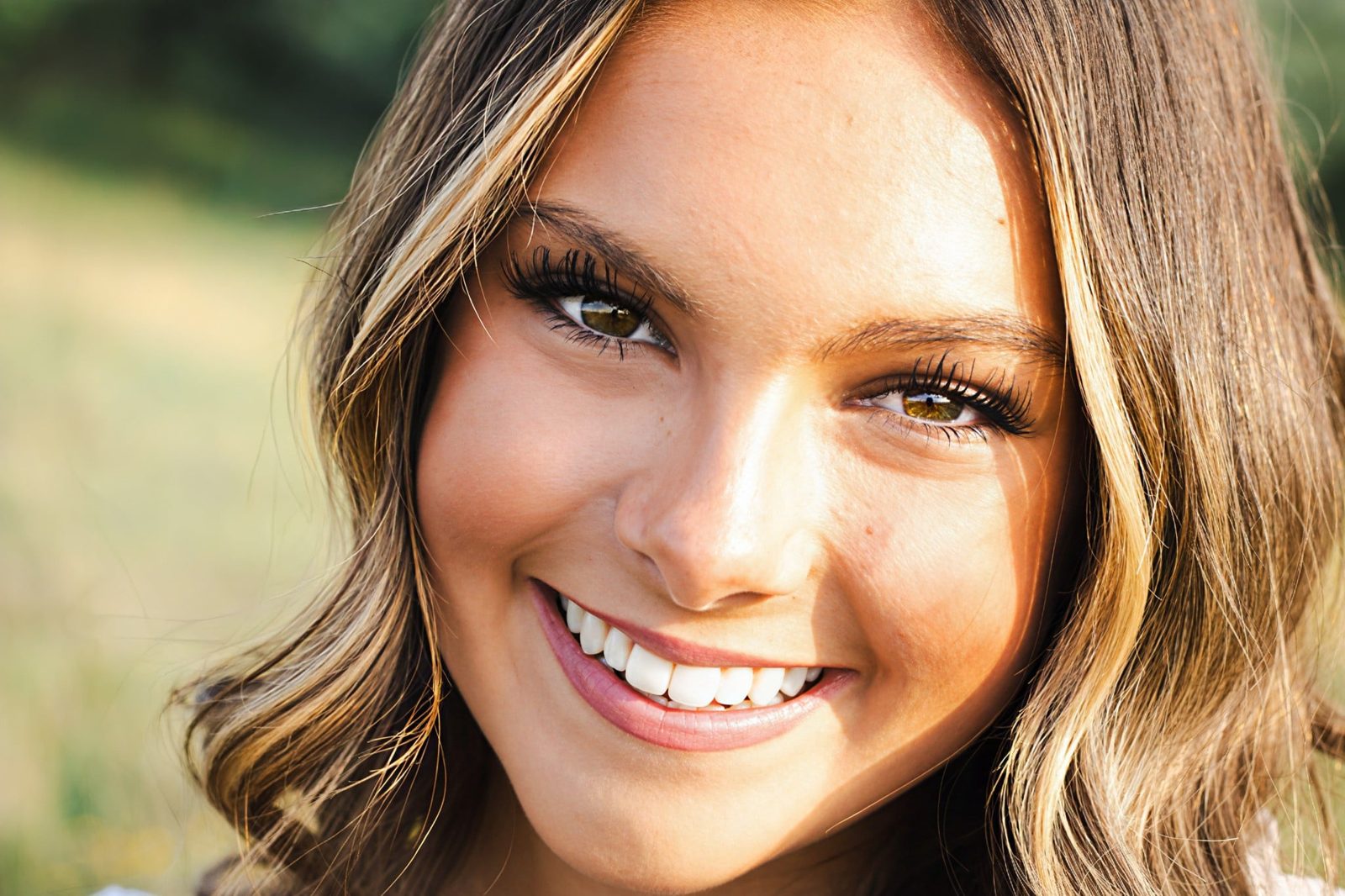 Close-up senior portrait at golden hour
