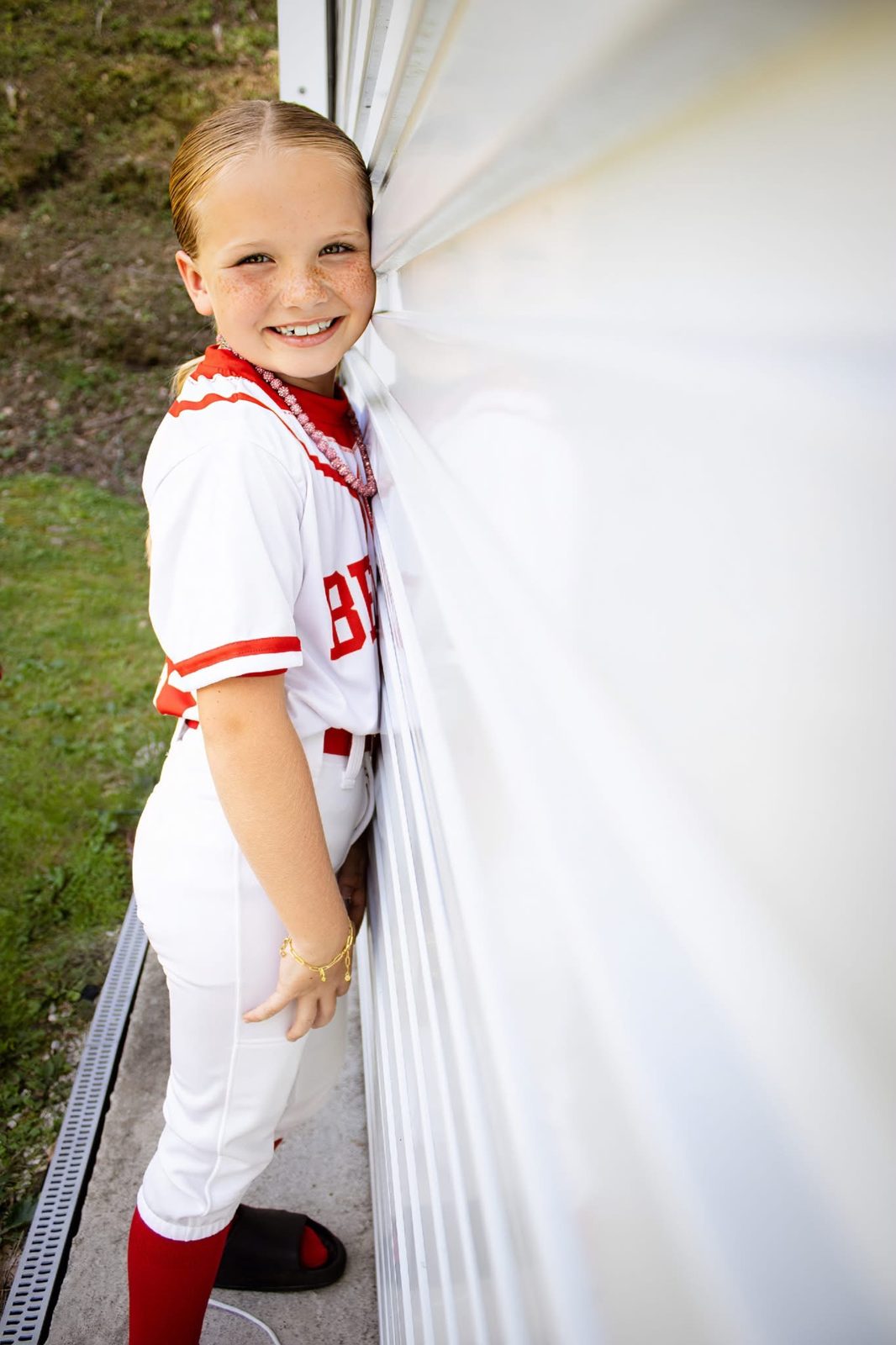Young baseball player in his Belfry uniform